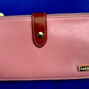 Two wallets with slots for credit cards and dollar bills